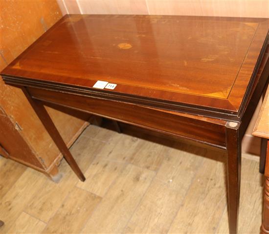 A George III mahogany folding games table